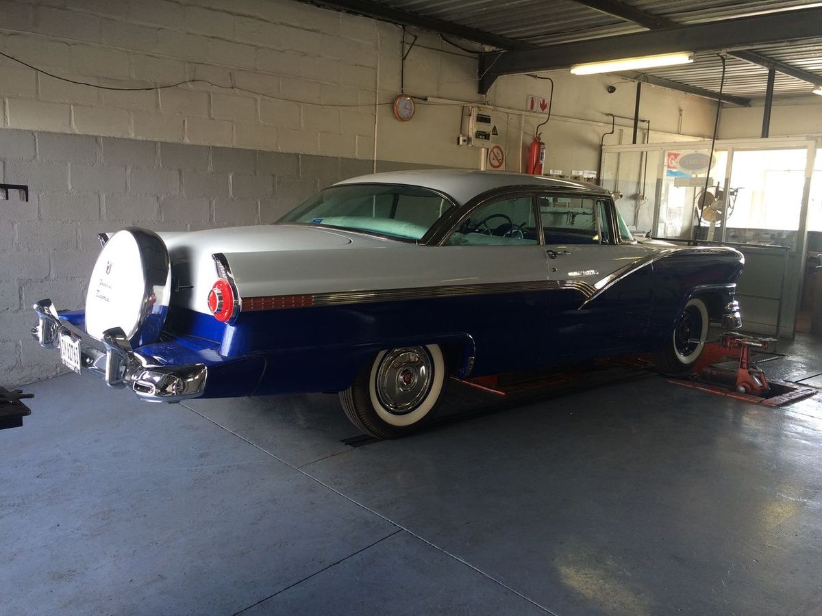 Classic two-tone Ford on the alignment bay